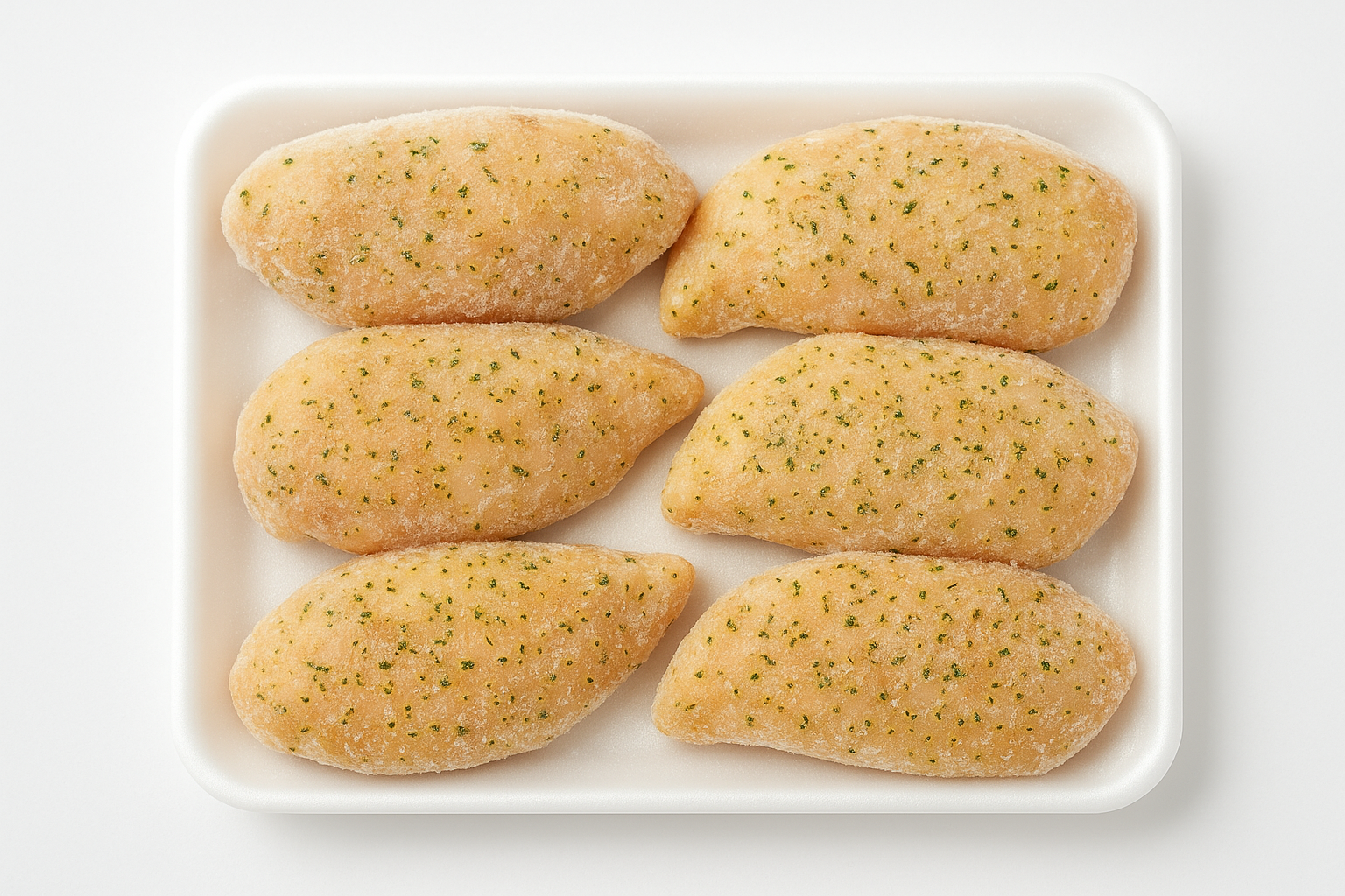 High-quality product photo of frozen all-natural seasoned chicken breasts, 5–6 pieces totaling 2.5 lbs, individually portioned and lightly seasoned with garlic, onion, and herbs. The chicken is arranged neatly on a white tray with a minimal, clean background. Frosted edges and a light icy texture to indicate it is fully frozen. Well-lit, sharp focus, professional e-commerce style suitable for Shopify product listing.